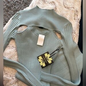 Blueish/green Cliche cutout  sweater dress. Size medium. NWT